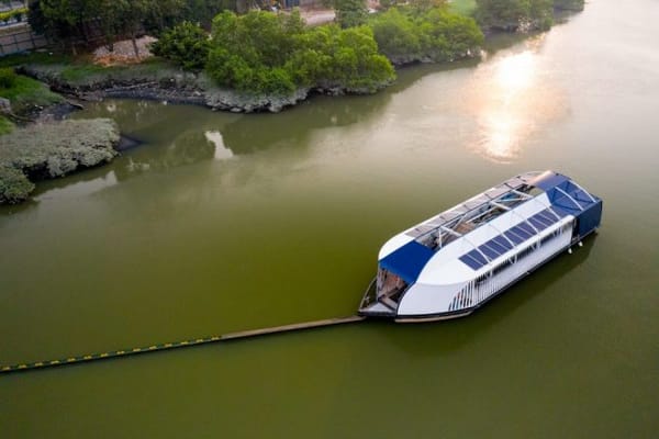 It’s a plastic-guzzling river barge